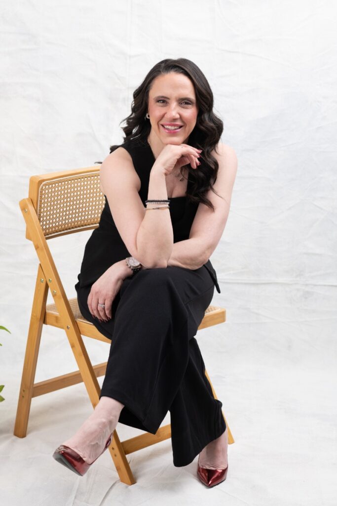 Dr. Liz seated for a Talessa Aesthetics & Wellness portrait